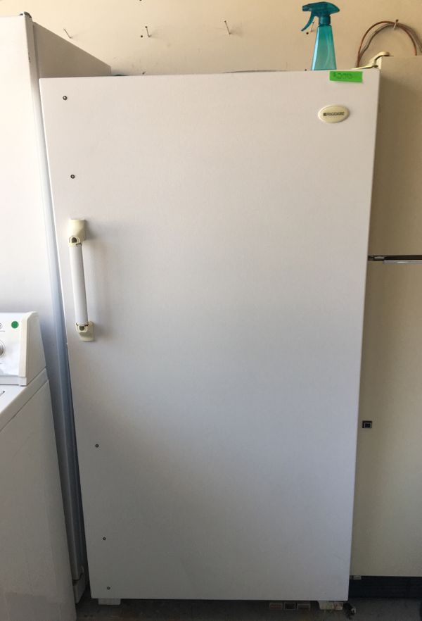 Frigidaire. upright freezer Comes with warranty. for Sale in