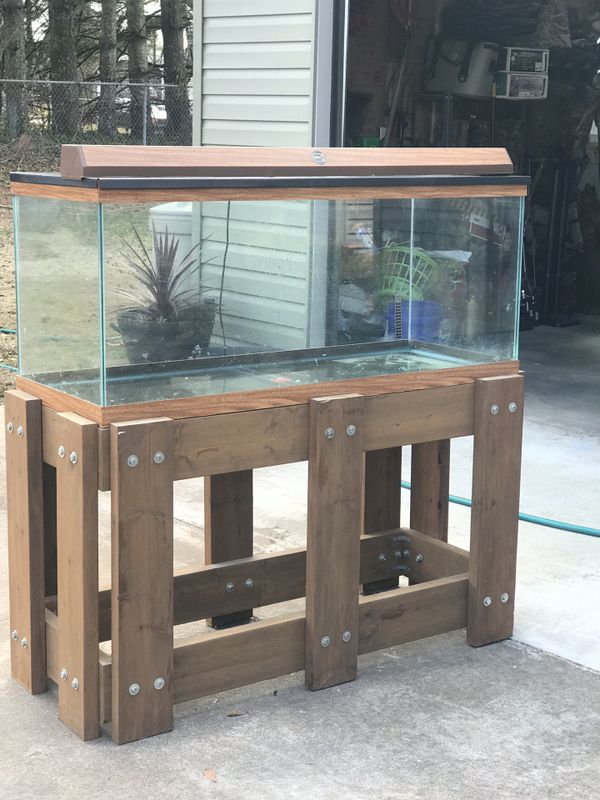 75 gallon Aquarium/Terrarium with stand, screen and light. Solid wood and heavy! Previously