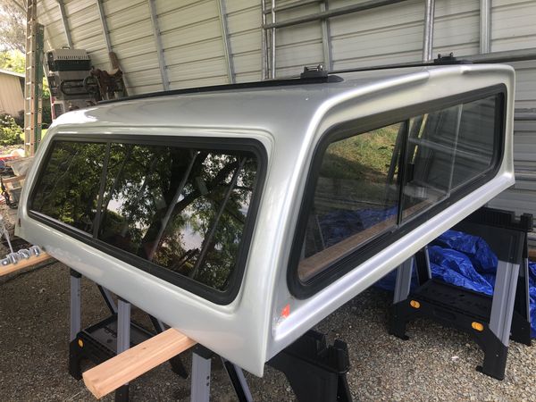 Leer silver camper shell for short bed 2012 Ford F-250. Looks like ...