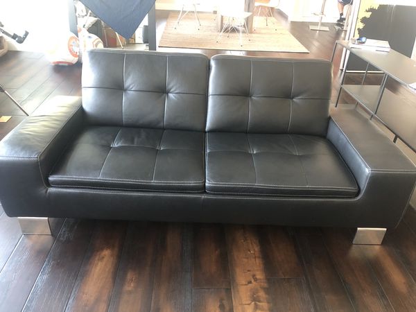 dania black leather sofa