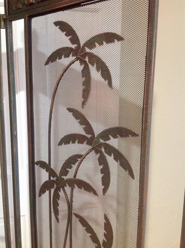 THREE PANEL METAL ROOM DIVIDER WITH ELEPHANT AND PALM TREE DECORATIONS