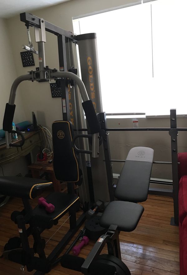 Gold’s gym XR55 and golds gym XR 6.1 weight bench with weight set for