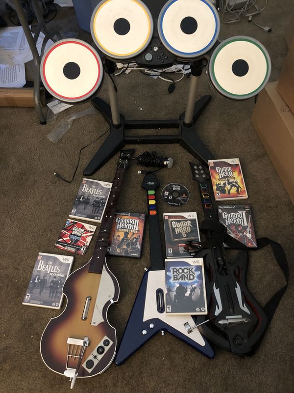 does ps2 guitar hero guitar work with rock band 2