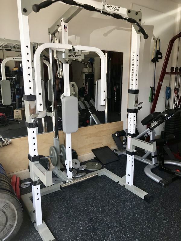 Tuff stuff squat rack weight bench with 300lbs and accessories for Sale in Saint Charles, MO