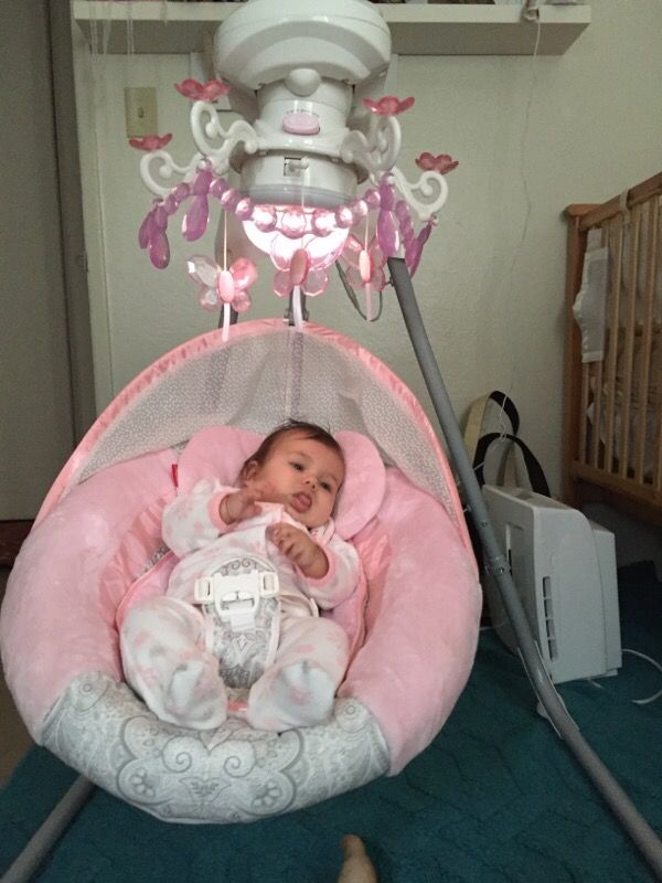 pink baby swing with butterfly lights