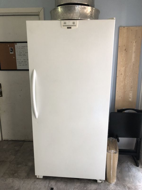 kenmore refrigerator frost in freezer
