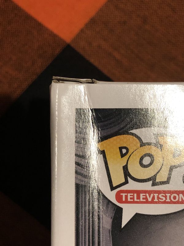 funko pop uncle fester with lightbulb