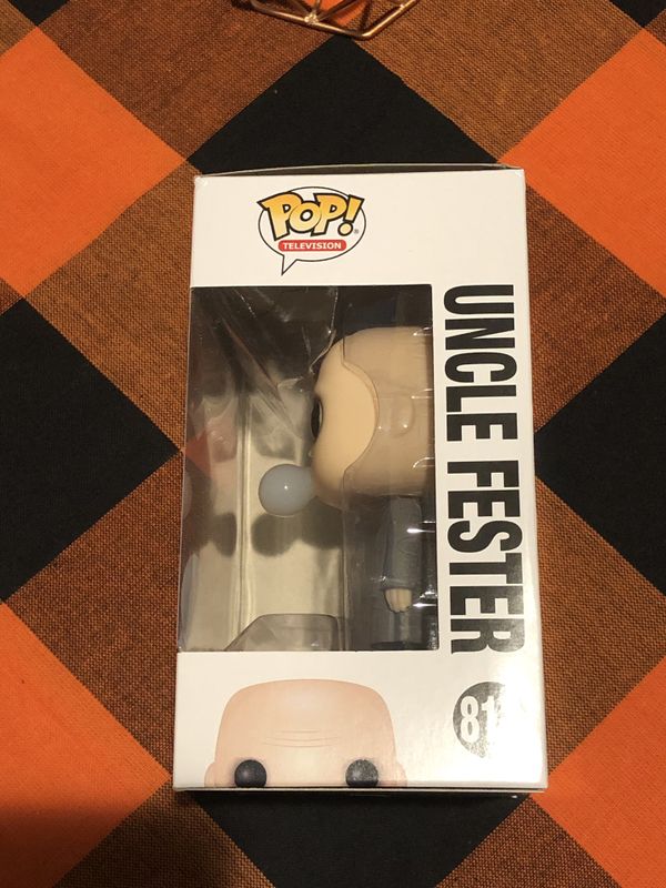 funko pop uncle fester with lightbulb