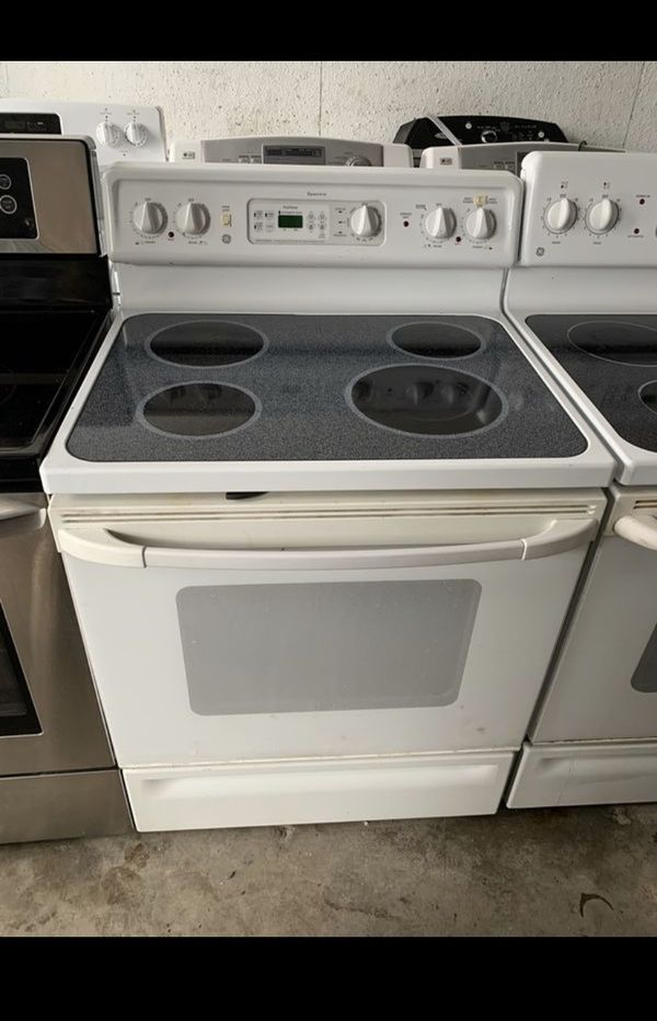 Ge white glass top stove / range / delivery available for Sale in Tampa