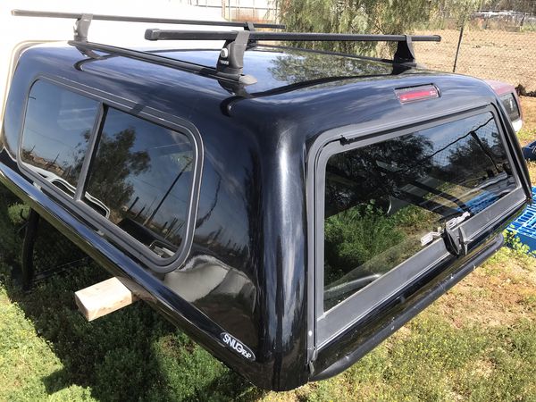 Camper shell Toyota Tacoma 5ft bed 2005 to 2015 for Sale in Perris, CA