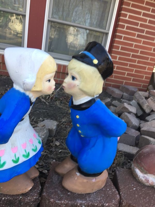 Kissing Dutch boy and girl yard statues for Sale in Bondurant, IA - OfferUp