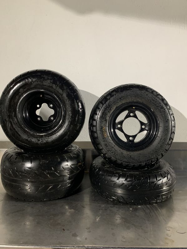 Atv Kawasaki kfx 400 Suzuki ltz 400 rims and tires for Sale in Fort