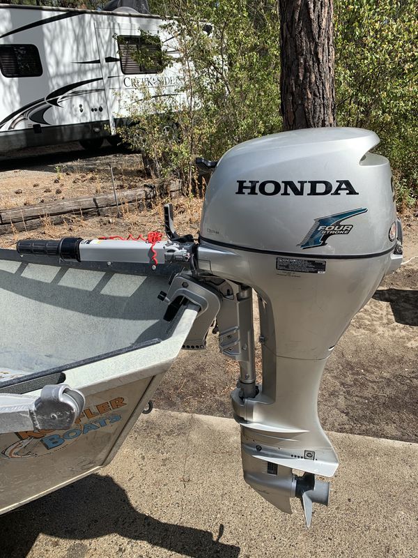Honda 9.9 long shaft outboard motor for Sale in Nine Mile