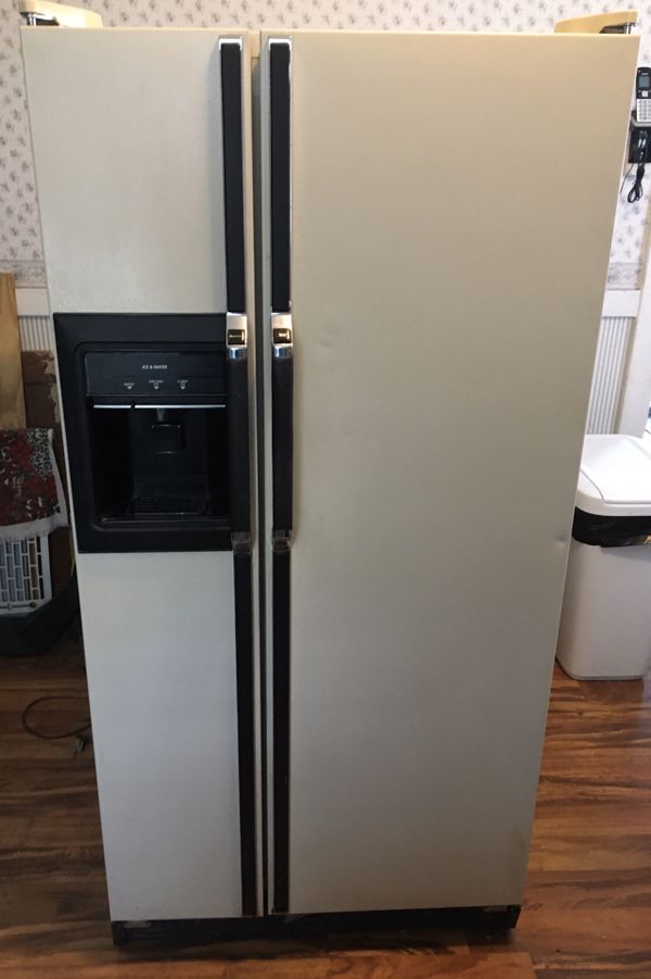 Kenmore 22 side by side refrigerator W/ ice and water door dispenser