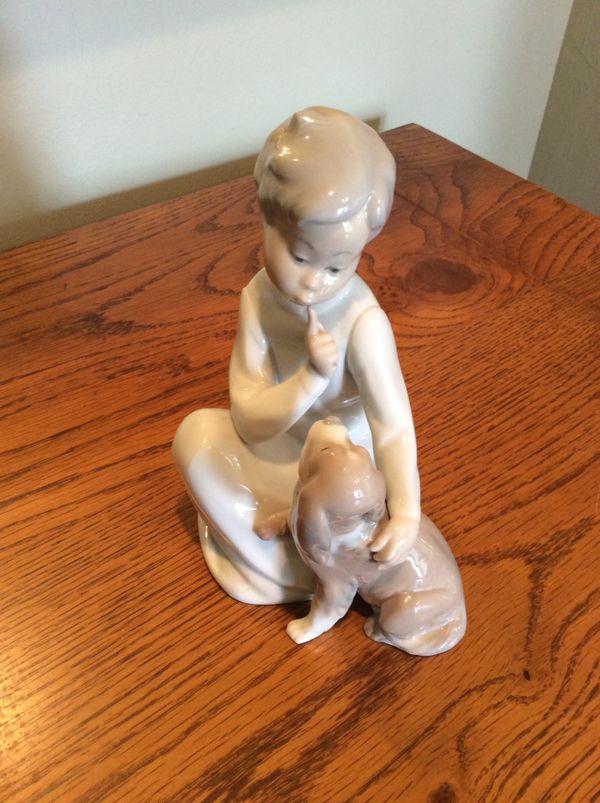 lladro man with dog