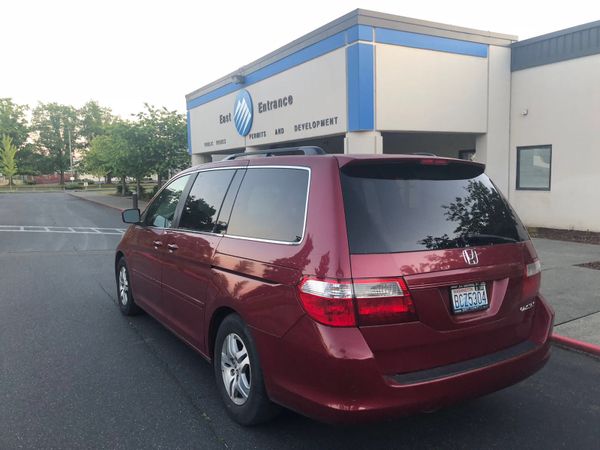 Maroon Honda Odyssey