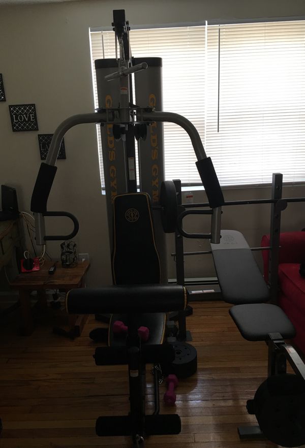 Gold’s gym XR55 and golds gym XR 6.1 weight bench with weight set for