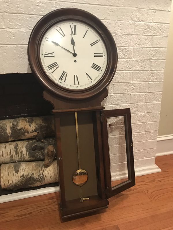 Vintage Howard Miller “Regulator” wall clock with Pendulum for Sale in