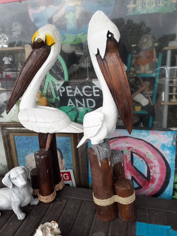 Cool really large carved wooden Pelican statues on post your choice 99
