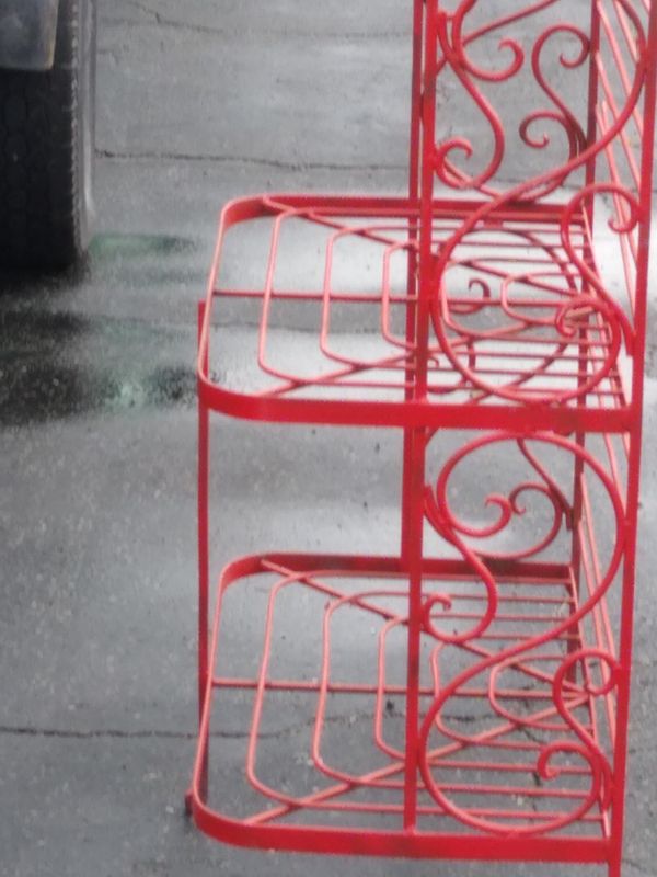 Red Beautiful Baker's rack or outside plant stand wrought iron for Sale