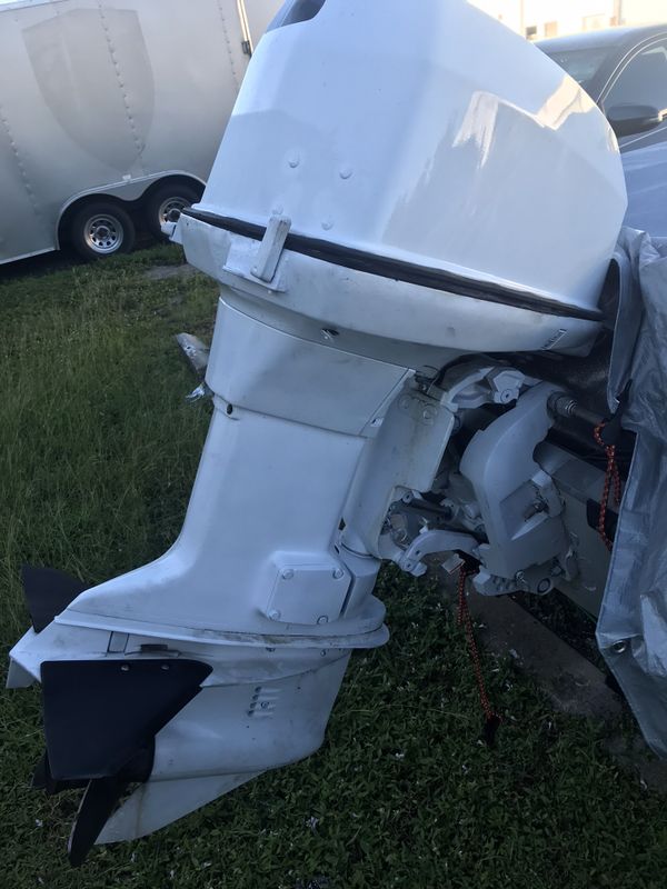 1991 Johnson 90hp 4 cylinders outboard motor. 2 cylinders w/low