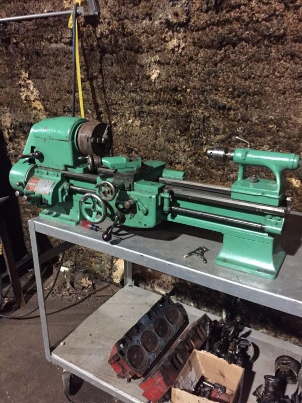 Logan lathe works great it's currently on its pedestals has tons of