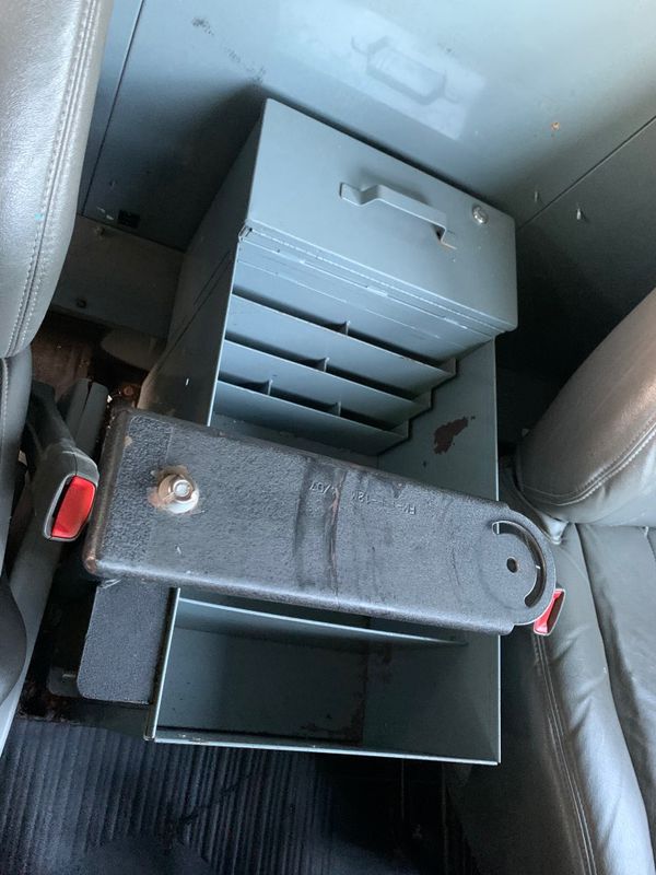 Cargo van cab file between seats storage desk laptop swivel
