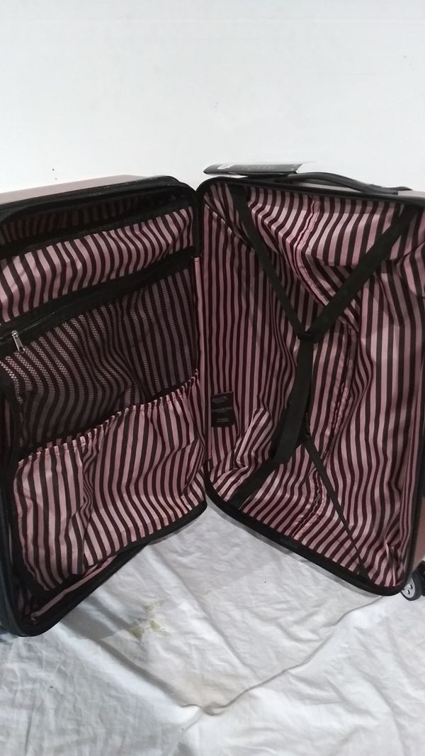 London fog 25" Medium luggage Hard Rose pink for Sale in West Chicago