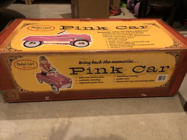 champion pink pedal car