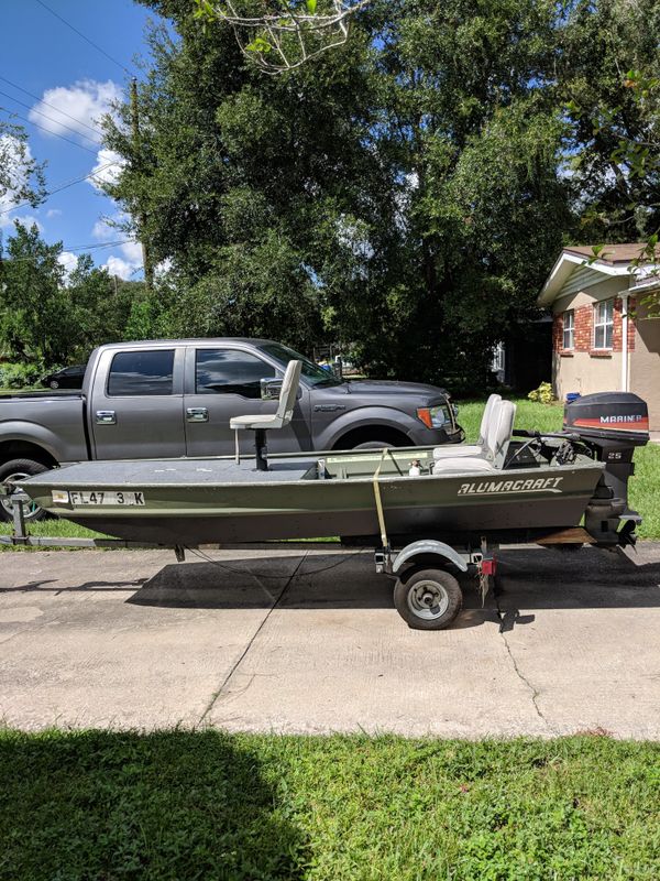 12' Alumacraft Jon Boat with 25 horsepower Mercury and trailer. No leaks motor starts every time