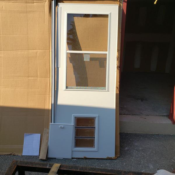 Anderson storm door with pet entrance for Sale in Chesapeake, VA OfferUp