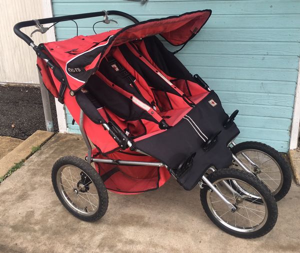 used triple jogging stroller