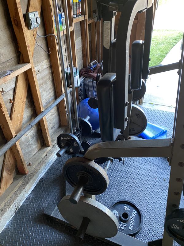 Nautilus smith machine. Squat rack. Pulley system. Bench and