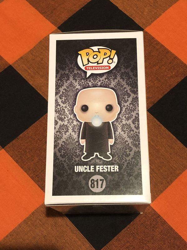 funko pop uncle fester with lightbulb