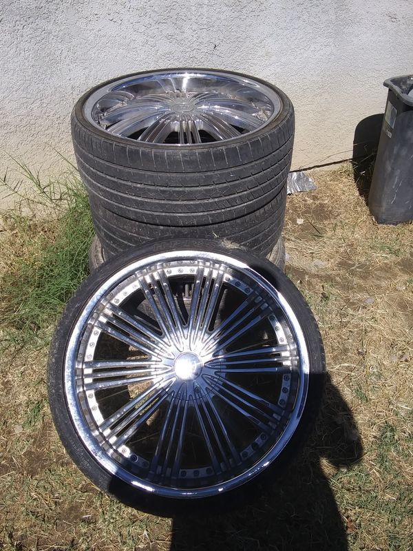 22 inch 5 lug universal rims ,3 tires are 80 one tire needs to be