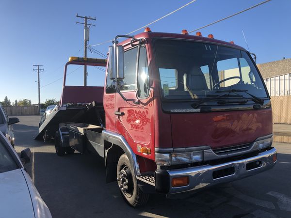 2004 NISSAN UD FLATBED TOW TRUCK for Sale in Hayward, CA - OfferUp