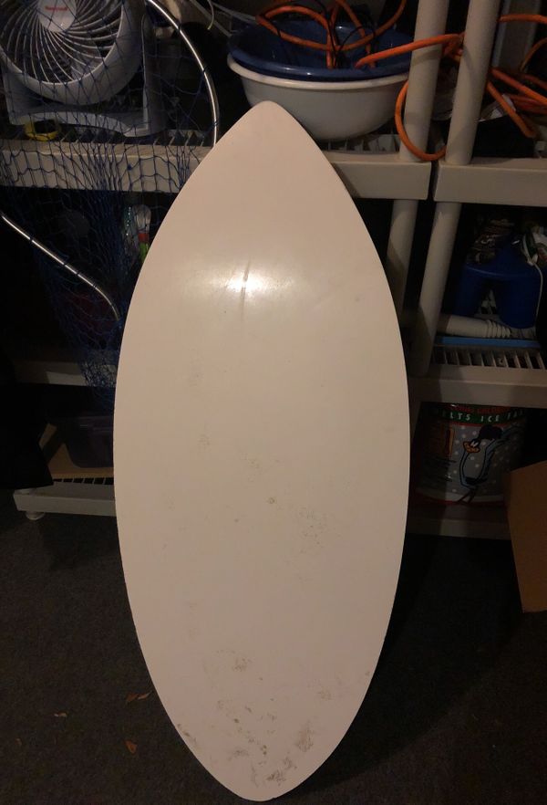Zap skimboards, fiber class skimboard with traction pads and GoPro