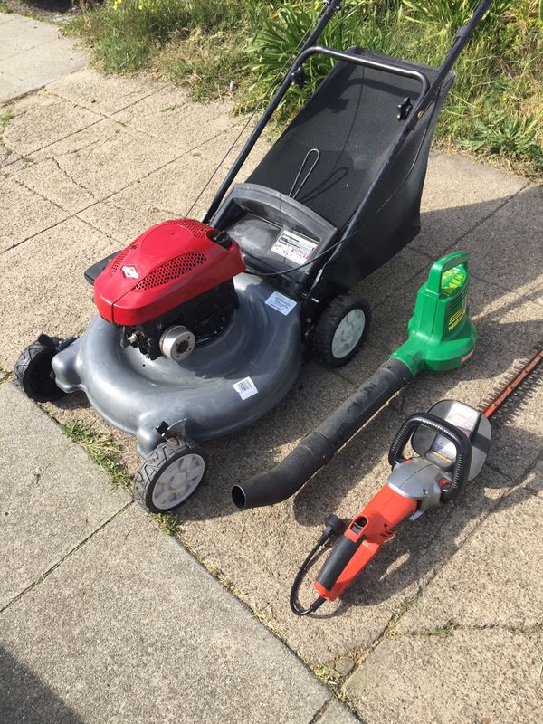 Craftsman 5.0HP gas push lawn mower, leaf blower, and hedge trimmer for