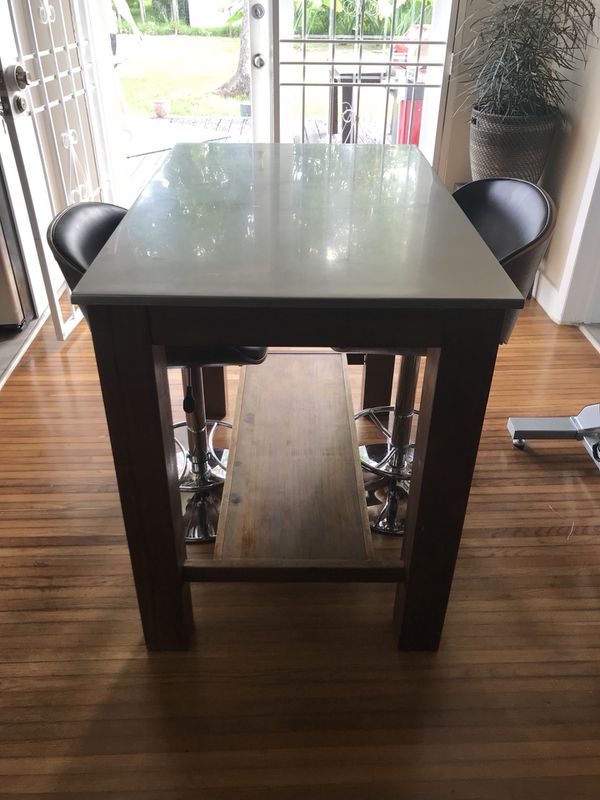 West Elm kitchen island/Dining table and 2 high top chairs for Sale in