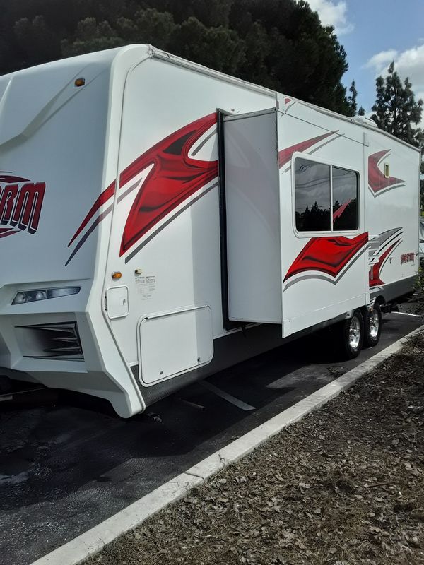 One owner 2011 sandstorm toy hauler 24 ft generator and fuel station