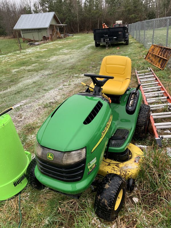John deer riding lawn mower and grass sweeper for Sale in Enumclaw, WA