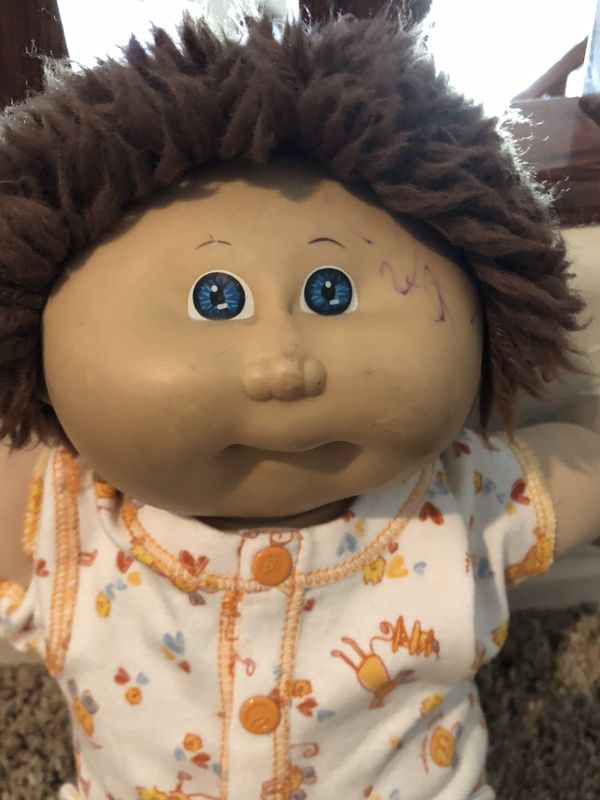 cabbage patch kid with brown hair