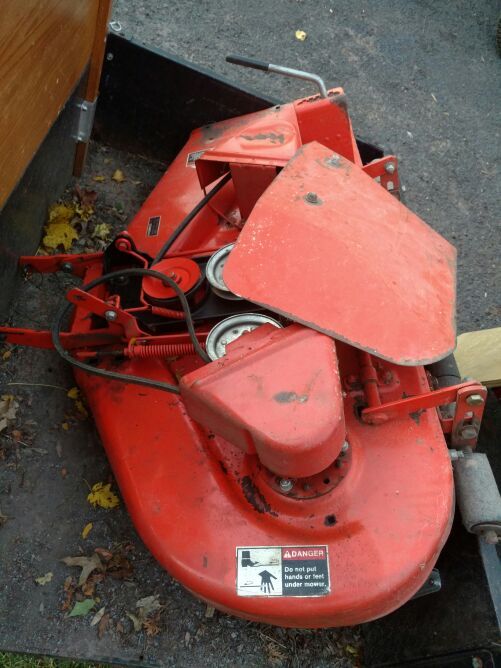 Simplicity 6216 garden tractor with plow wheel weights chains and mower