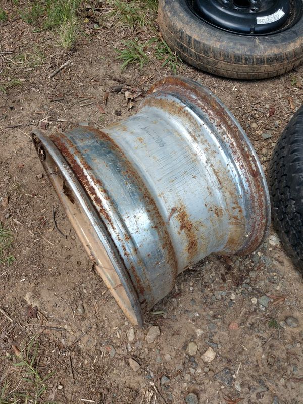 Used 15 inch rim (one) (saw blades) reverse offset 15x10 chrome deep