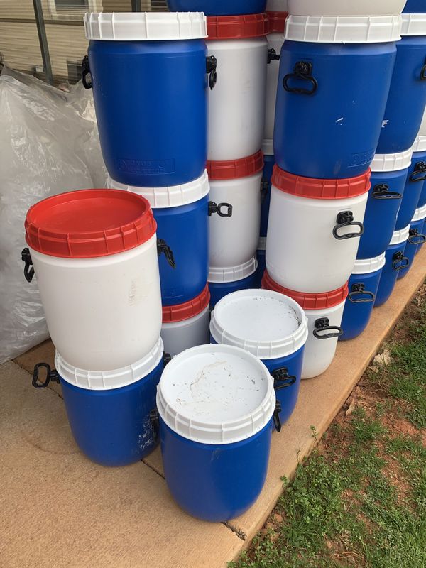 10 gallon containers/ barrels with screw top and handles. Coolers