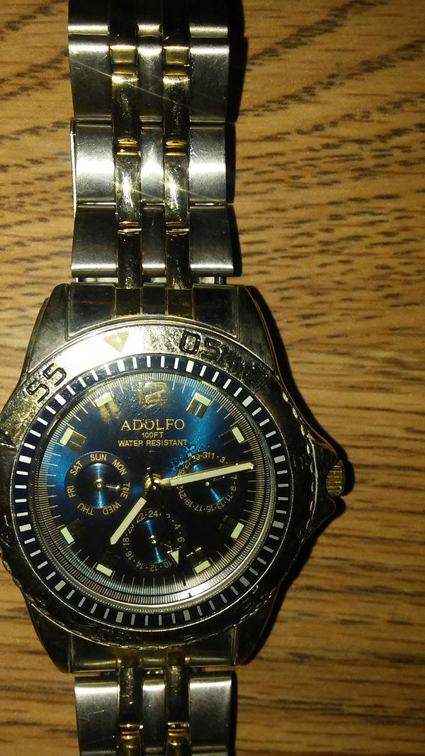 adolfo watch 100ft water resistant