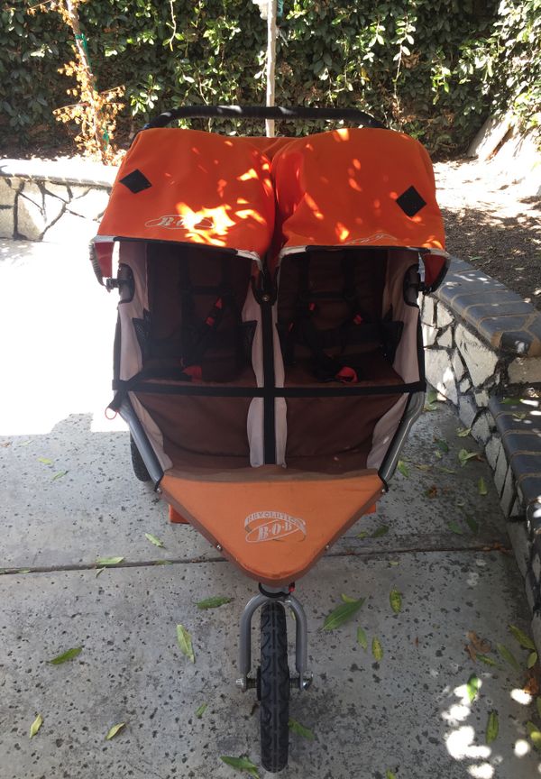Bob Double Jogging Stroller Orange Good Condition for Sale in Santa Ana