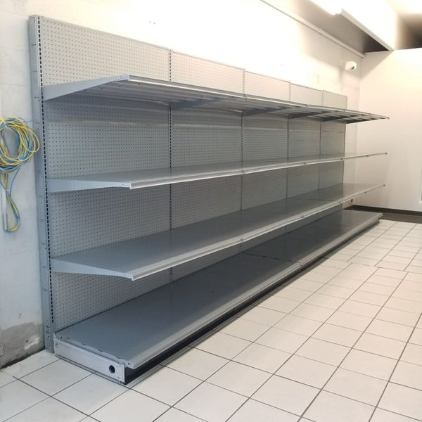 Grey gondola shelves Like New Industrial/ commercial gondola shelving
