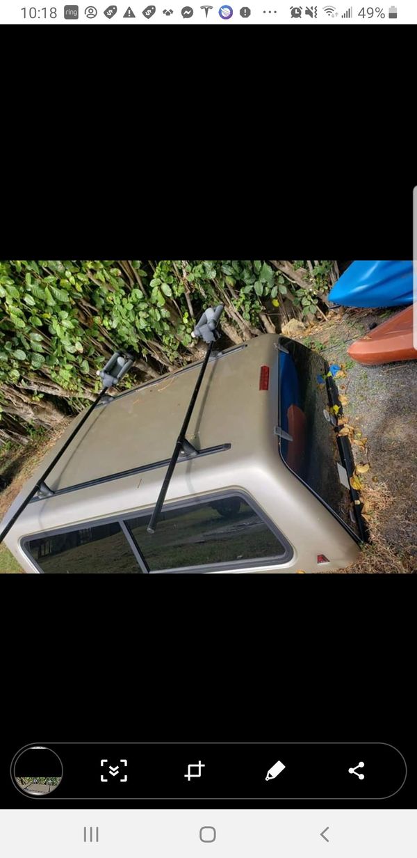 Leer Camper Shell for Toyota Tundra with surf racks and kayak holder for Sale in Kaneohe, HI