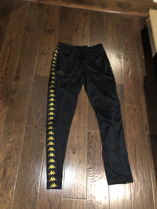 black and yellow kappa pants